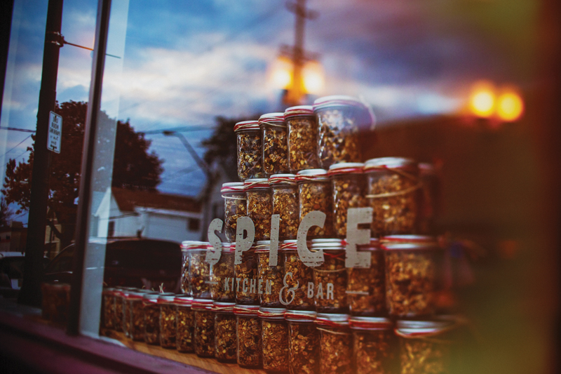 sign of spice bar and kitchen